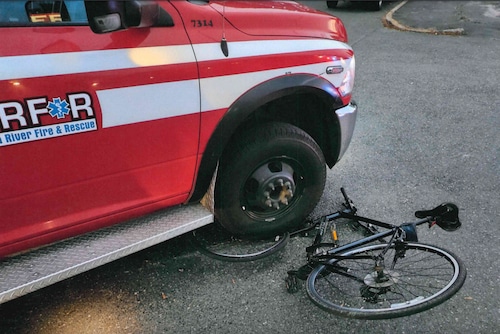 Ambulance hits cyclist